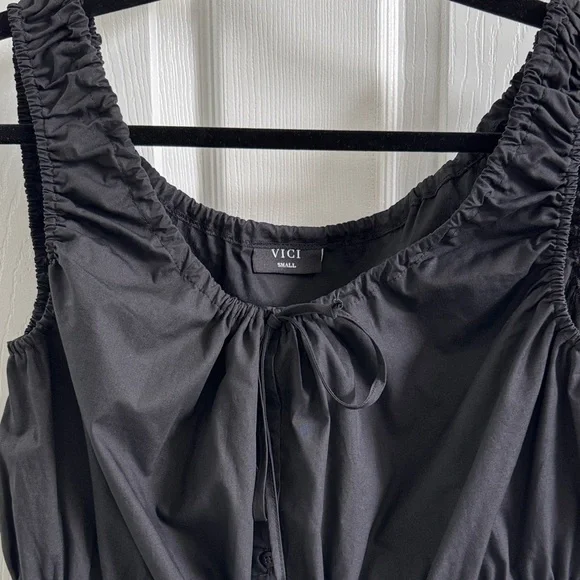 VICI-NWOT-Deanna Sleeveless PeplumTie Front Top - Picture 7 of 14